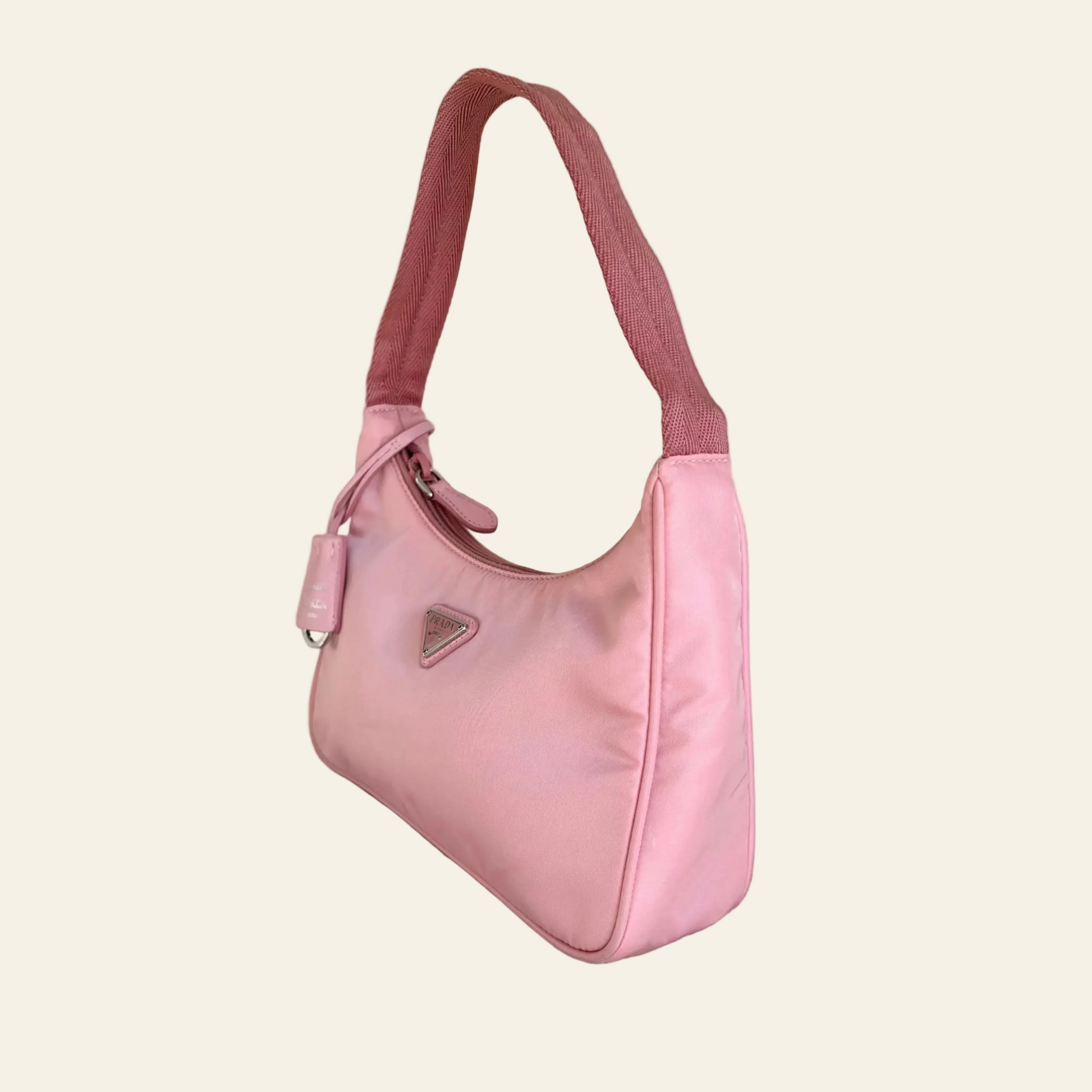 Prada Re-Edition 2000 pink nylon mini bag front side view