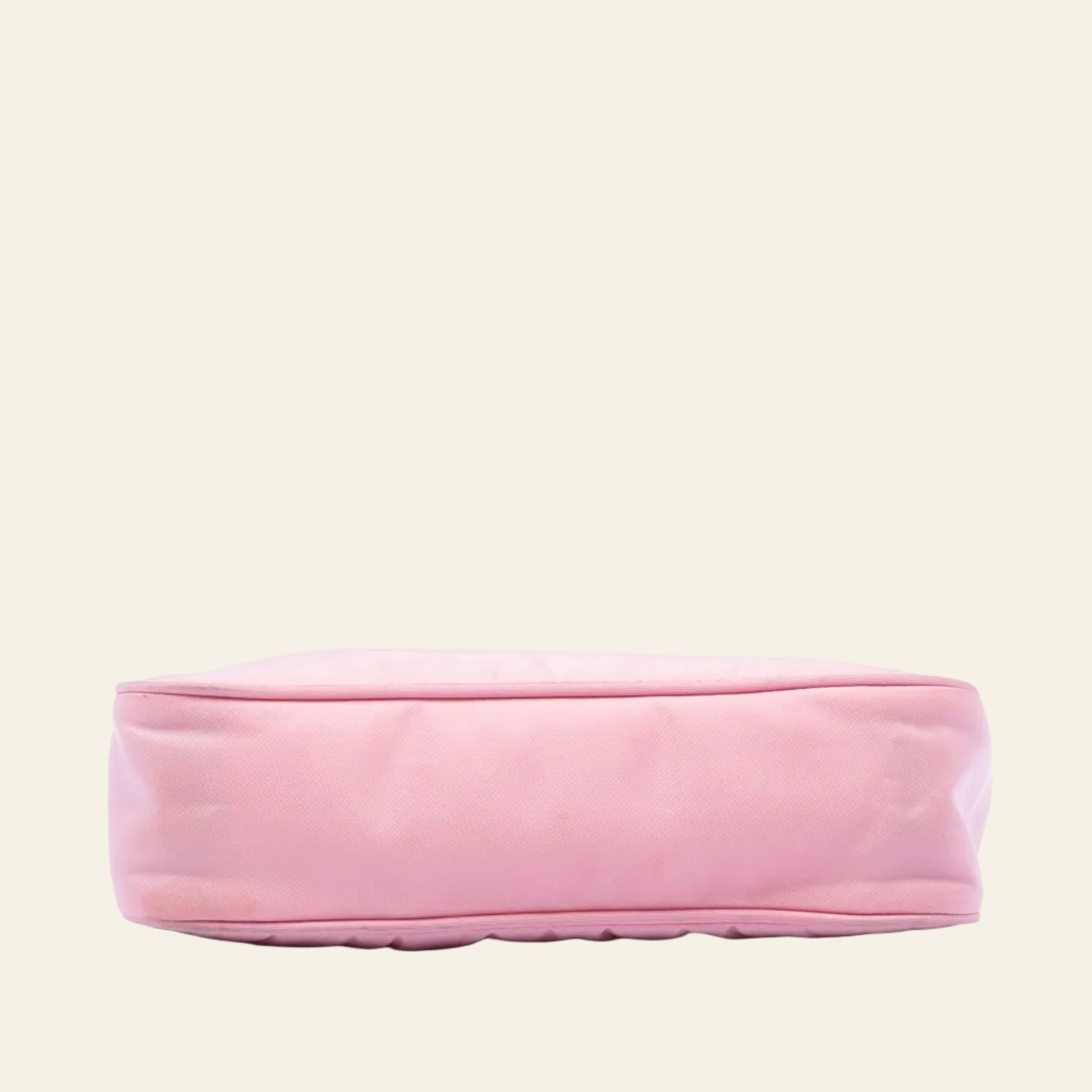 Prada Re-Edition 2000 pink nylon mini bag bottom view